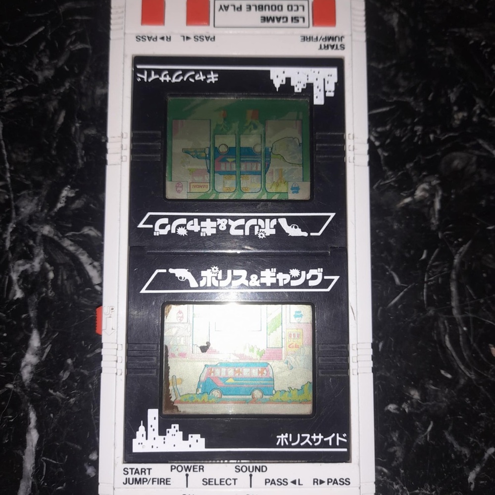 LSI BANDAI ELECTRONICS LCD DOUBLE PLAY POLICE & GANG MADE IN JAPAN 1984